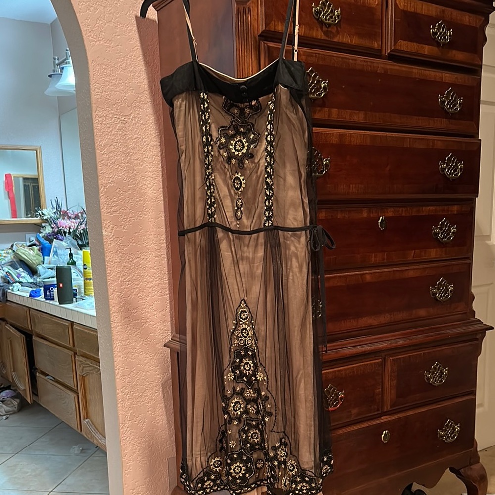 Elegant Black and Gold Embellished Dress